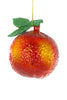 A textured glass ornament shaped like a peach or orange, featuring a red and yellow gradient body with a green glittery leaf and a gold hanging string, isolated on a white background.